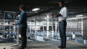 System administrators in data center using laptop to monitor neural network LLM visualization. Server hub teamworking colleagues overseeing rigs powering machine learning processes, camera A - Powered by Shutterstock - Get 15% off with code: PIKWIZARD15