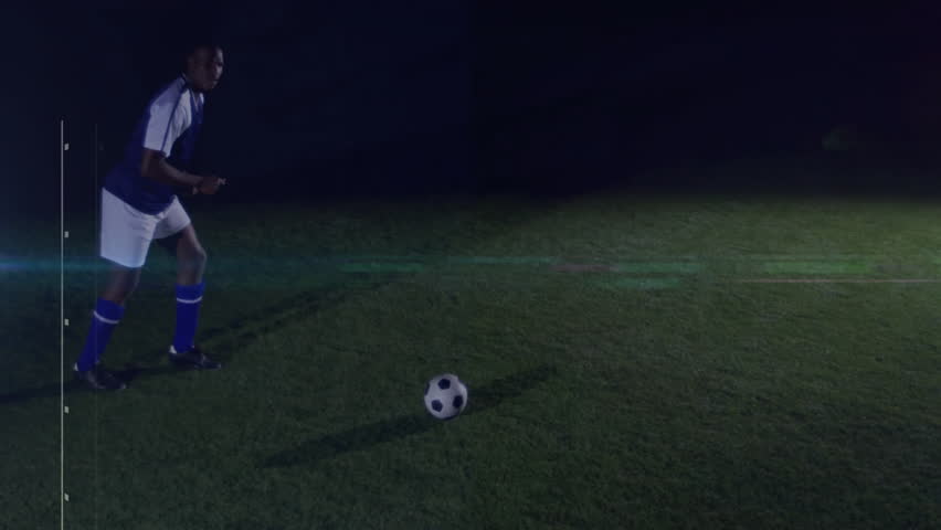 Male soccer player shifting weight and kicking ball while digital HUD charts pulsing analytics data. Athletic, performance, sports, futuristic, data, analysis, technology - Powered by Shutterstock - Get 15% off with code: PIKWIZARD15