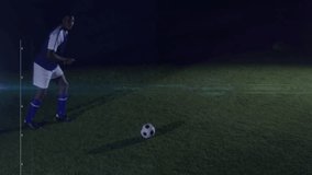 Male soccer player shifting weight and kicking ball while digital HUD charts pulsing analytics data. Athletic, performance, sports, futuristic, data, analysis, technology - Powered by Shutterstock - Get 15% off with code: PIKWIZARD15