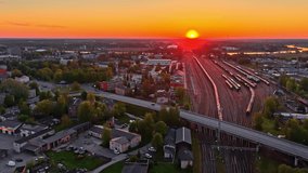 City sunset with railway yard, aerial view of tracks and buildings at golden hour - Powered by Shutterstock - Get 15% off with code: PIKWIZARD15