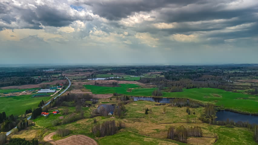 Dark Clouds Rolling Over Non-Urban Remote Landscape. Timelapse