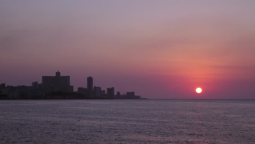 HAVANA - CIRCA APRIL 2013: Sequence of skyline, buildings and sunset on the ocean in the city, circa April 2013 in Havana, Cuba 