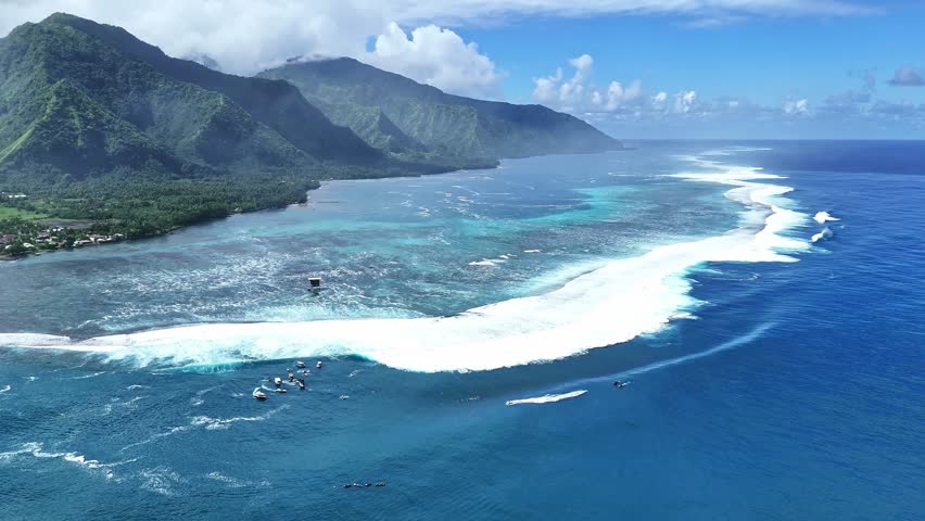 Drone Tahiti. tropical island lagoon, coastal mountains. Aerial view of French Polynesia. Teahupoo is a famous surfing destination near Papeete. Adventure travel. 