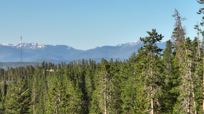 Telephoto drone shot of sunrise in the Rocky Mountains of Colorado