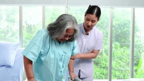 Attractive young asian woman or nurse take care senior old woman on cane or walker feeling helpful and empathy at nursing home or room hospital . Hip, knee and leg problem in older people. - Powered by Shutterstock - Get 15% off with code: PIKWIZARD15