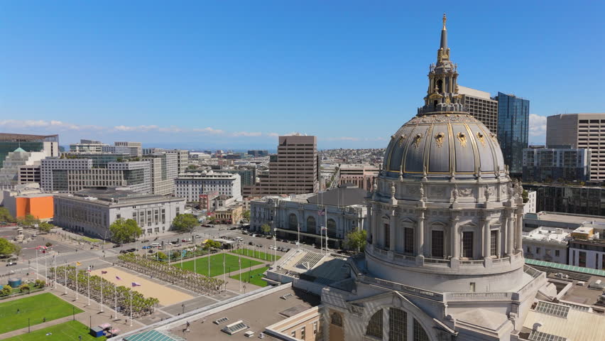 Incredible aerial drone footage that reveals the stunning beauty of San Francisco City Hall alongside the vibrant and modern downtown skyline of this iconic Californian city