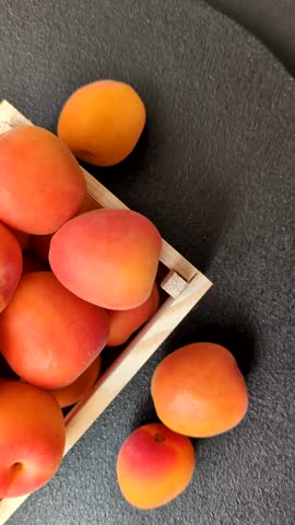 Fresh ripe fruit apricots are red yellow in color. Apricots as a background for your design