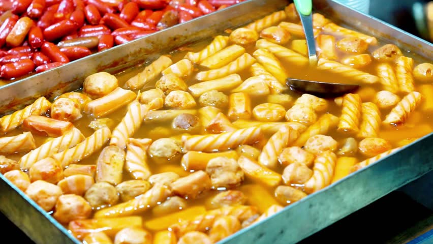 Tteokbokki, Korean dish of rice flour cooked in spicy and sweet gochujang seasoning. Street korean food.