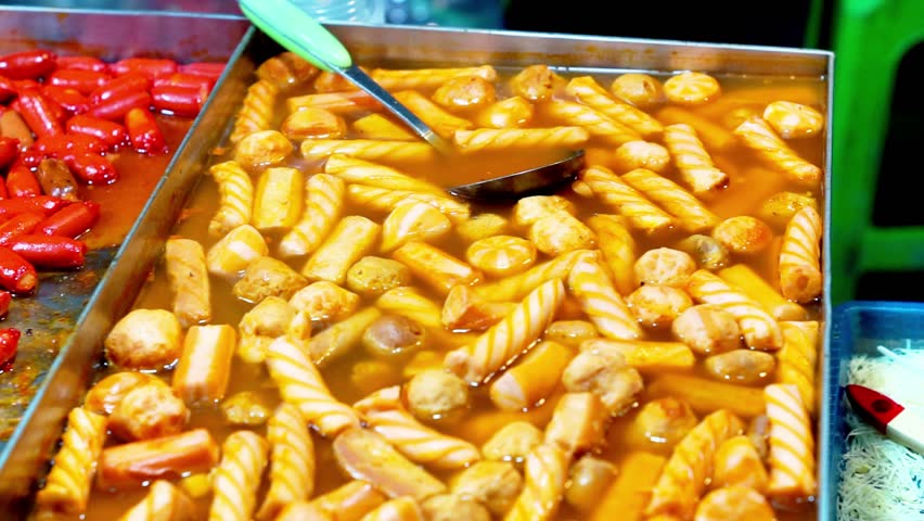 Tteokbokki, Korean dish of rice flour cooked in spicy and sweet gochujang seasoning. Street korean food.