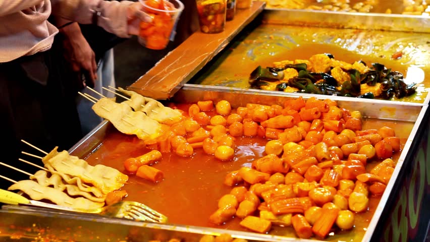 Tteokbokki, Korean dish of rice flour cooked in spicy and sweet gochujang seasoning. Street korean food.