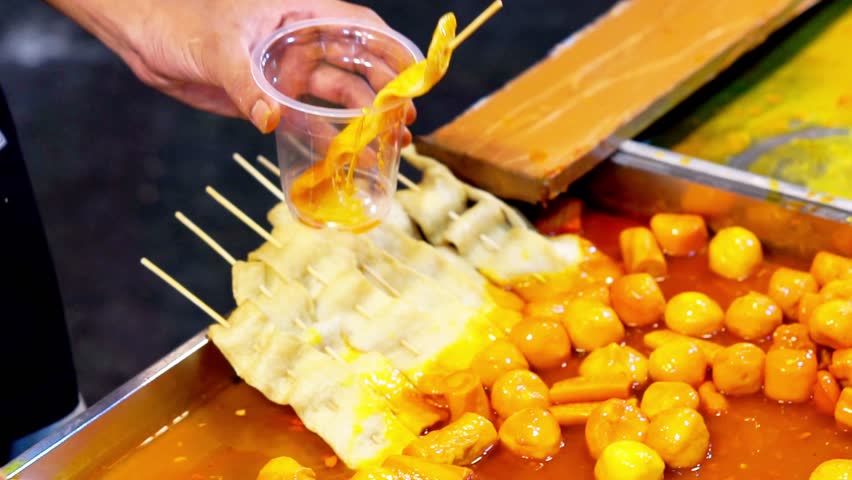 Tteokbokki, Korean dish of rice flour cooked in spicy and sweet gochujang seasoning. Street korean food.