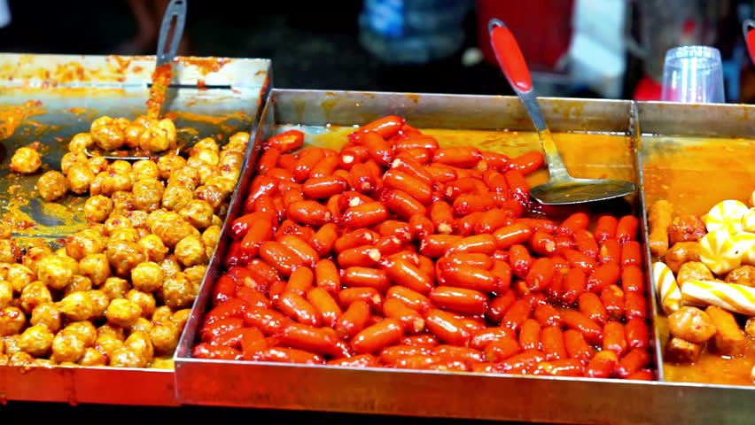 Tteokbokki, Korean dish of rice flour cooked in spicy and sweet gochujang seasoning. Street korean food.