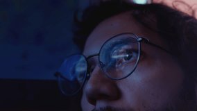 A man with glasses is looking at an MRI monitor, the result of research. The male sees a 3D model of the brain, a VR image. Studying the neural network inside the human body - Powered by Shutterstock - Get 15% off with code: PIKWIZARD15