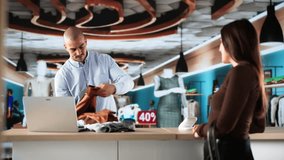 Retail Shop Cashier Counter. Customer Paying For Clothes - Powered by Shutterstock - Get 15% off with code: PIKWIZARD15