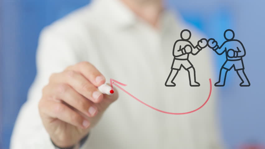 Professional businessman strategizing boxing match outcome, sketching fighting boxers and trajectory arrow on transparent planning board in corporate office setting