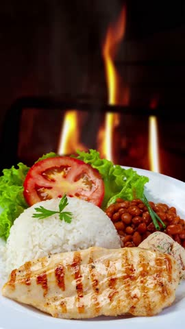 Grilled chicken fillet, rice, beans and salad