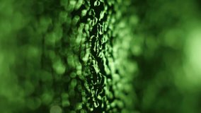 Wave surface vibration oil liquid in green color. Macro close up super slow motion 1000 fps dynamic vertical video. Create pulse wave in dark black green background. Purity clean water vibrant effect - Powered by Shutterstock - Get 15% off with code: PIKWIZARD15