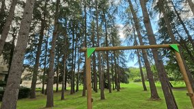 Childrens playground monkey bars in a pine forest, concept of outdoor recreation, childhood, nature play - Powered by Shutterstock - Get 15% off with code: PIKWIZARD15