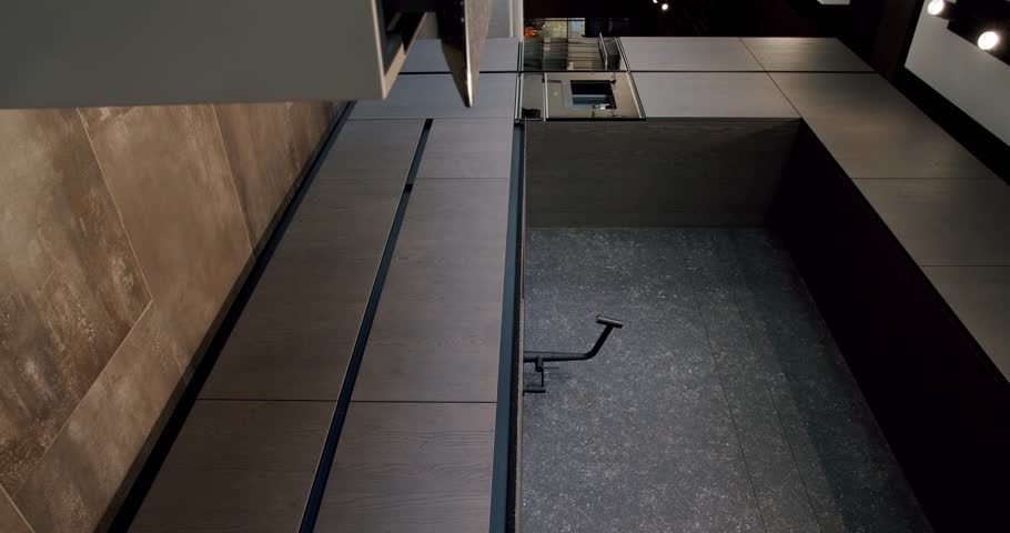 Real Estate. Luxury kitchen with an island. Modern and spacious wooden kitchen room. Modern interior in luxury house. Real Luxury Design Interior. Neoclassic Style, cozy interior. Vertical video.