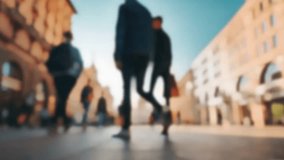 The unfocused, blurry crowd of people walking in the street. Slow motion. - Powered by Shutterstock - Get 15% off with code: PIKWIZARD15
