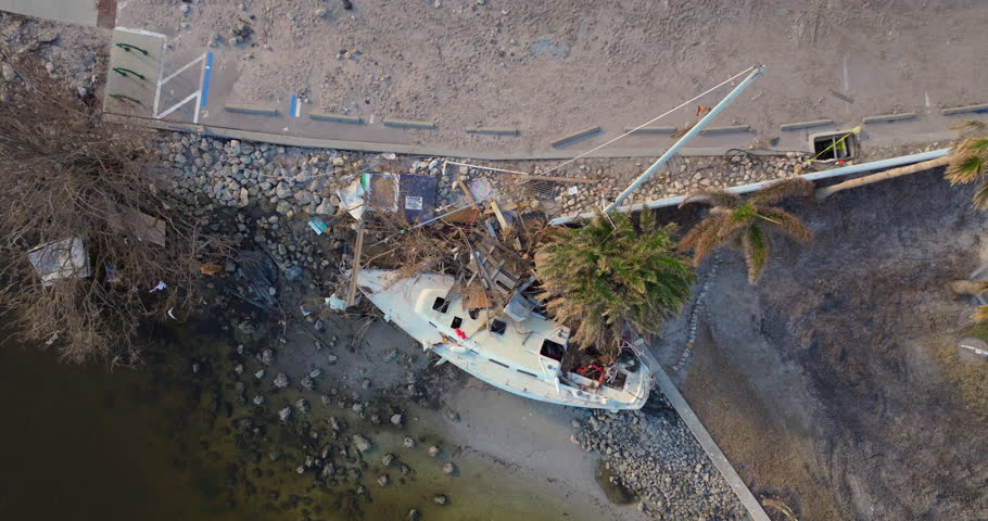Heavily damaged sailing yachts after hurricane Milton in Englewood, Florida.