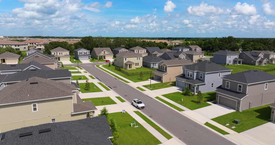 Large residential homes in southwest Florida gated community. American houses in rural US suburbs