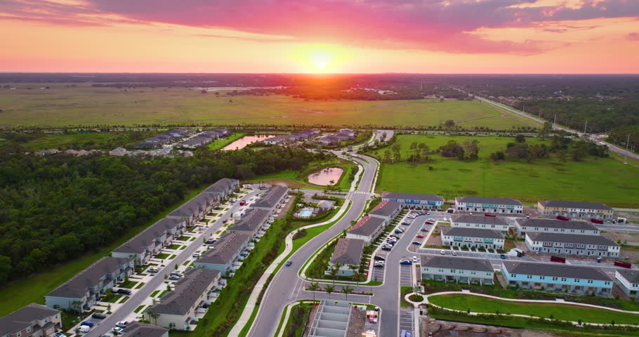 Suburban Florida residential complex with modern condominiums and landscaped surroundings, illustrating U.S. housing trends.