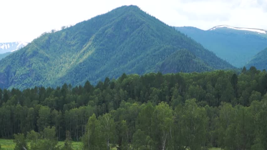 Eagle flight over mountain river