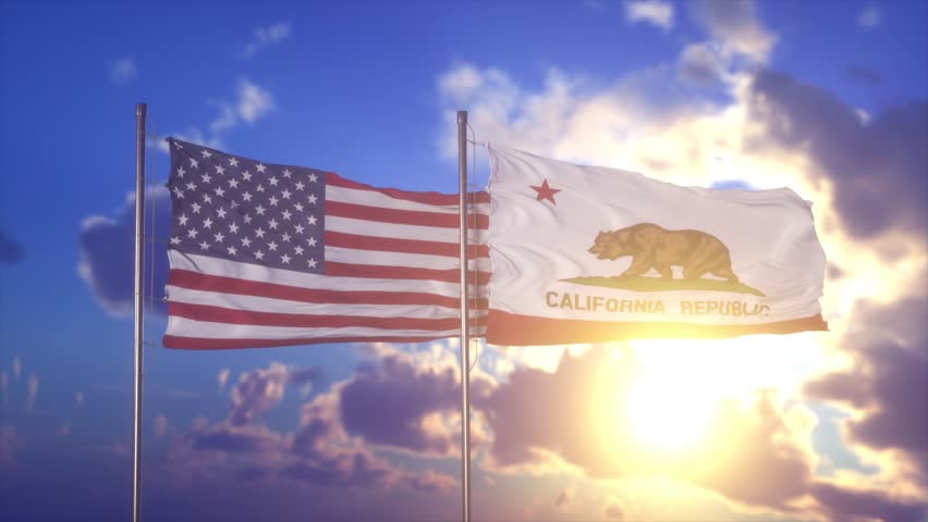 USA and California State Flags Waving Together at Sunset Sky