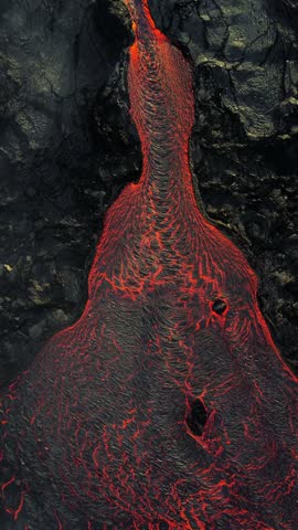 Vertical Screen: Volcano eruption in 2023, Red burning lava erupts from the ground in Iceland. Formation of a new active volcano. Aerial footage. Shot for Social Media.