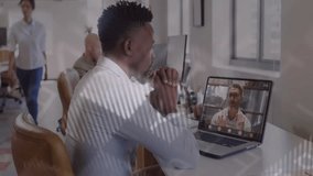 Office pro leaning into laptop while host presenting business data, receiving file, overlays rising. Professional, collaboration, data visualization, teamwork, modern, corporate, technology - Powered by Shutterstock - Get 15% off with code: PIKWIZARD15