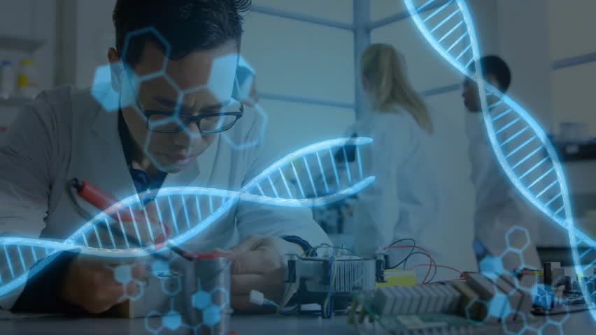 Male scientist soldering circuit board sparking DNA helix and code graphics intensifying around bench. Research, innovation, futuristic, technology, collaboration, precision, science - Powered by Shutterstock - Get 15% off with code: PIKWIZARD15