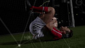 Soccer player gripping injured knee and curling into fetal position with pulsing data overlays. Athlete, sportswear, match, action, stadium, resilience, technology - Powered by Shutterstock - Get 15% off with code: PIKWIZARD15