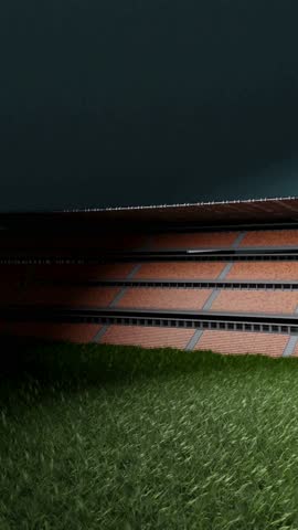 Laptop on a football field with stadium seats in the background