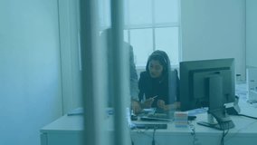 Business manager pointing at graph for project review analyst jotting notes while viewing charts. Corporate, teamwork, data, analysis, presentation, modern, professional - Powered by Shutterstock - Get 15% off with code: PIKWIZARD15