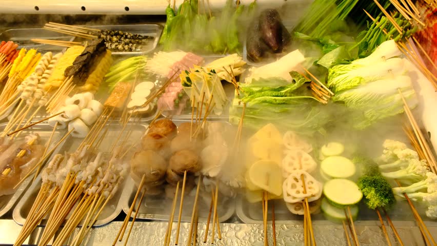 fresh fruit and vegetable casseroles in dry ice at the market in Chongqing, China