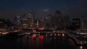 Stunning aerial view of San Francisco, beautiful at night, remarkable city skyline, illuminated buildings and enchanting fog hovering over the bay with full moon, San Francisco, California, USA - Powered by Shutterstock - Get 15% off with code: PIKWIZARD15