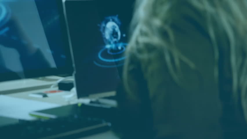 Seated woman at desk viewing holographic globe data after coworker showing tablet in tech office. Futuristic, innovation, collaboration, digital, technology, workspace, analysis - Powered by Shutterstock - Get 15% off with code: PIKWIZARD15