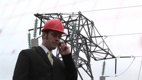 Engineer initiating phone call and coordinating power-line inspection with animated diagrams. Technician, infrastructure, professional, industrial, communication, safety, digital - Powered by Shutterstock - Get 15% off with code: PIKWIZARD15