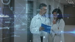 Data overlay fading in as two doctors discussing test results and tapping file then walking hallway. Medical, collaboration, technology, analysis, healthcare, professional, network - Powered by Shutterstock - Get 15% off with code: PIKWIZARD15