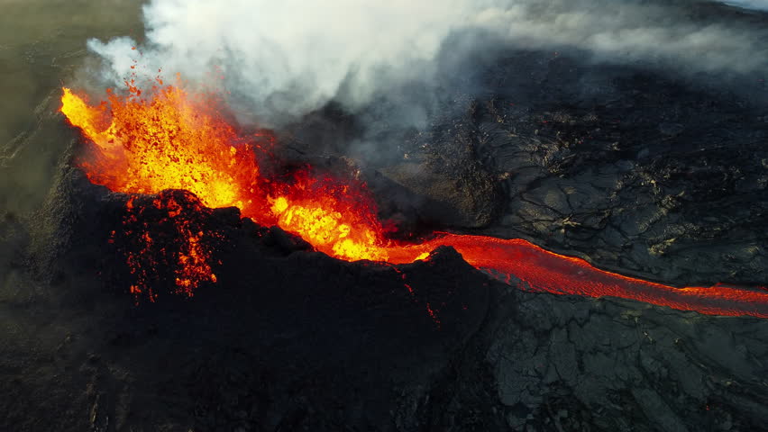 Volcano Eruption, Flowing Red Hot Lava Erupts from Crater, Incredible Natural Phenomena, Spectacular Dramatic Scenery in Iceland - Powered by Shutterstock - Get 15% off with code: PIKWIZARD15