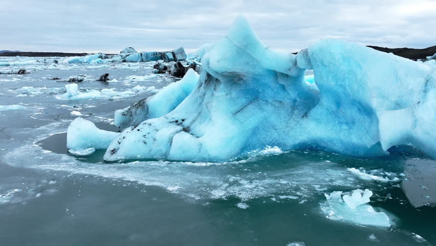 Icebergs from melting glacier in Jokulsarlon glacier lagoon in Iceland, Arctic nature ice landscape