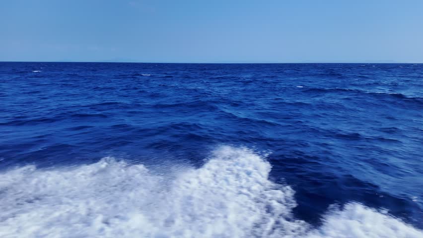 fierce waves crashing against ship, creating splashes and dramatic white foam on water, super slow motion