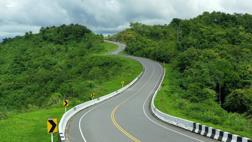 Road no.3 or sky road over top of mountains with green jungle in Nan province, Thailand.