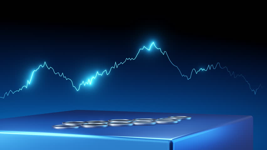 Financial graph and data seen through a magnifying glass with silver coins. Concept of business success and investment growth.