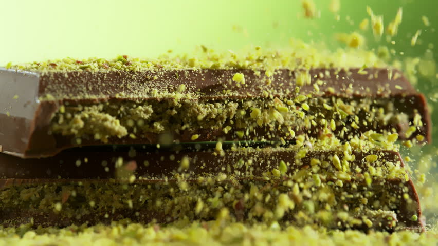 Super Slow Motion of Crushed Pistachios Falling on Dubai Chocolate Pieces at 1000fps.