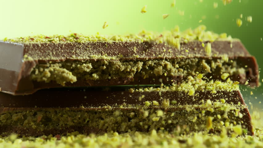 Super Slow Motion of Crushed Pistachios Falling on Dubai Chocolate Pieces at 1000fps.