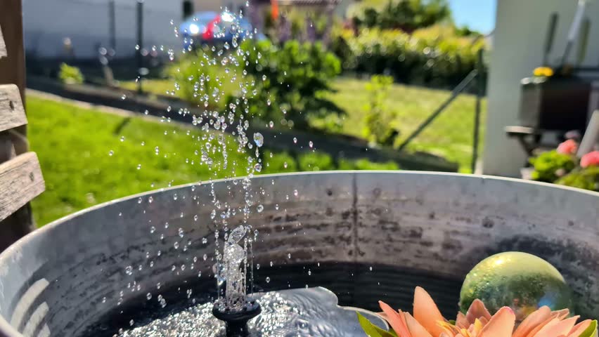 Solar Fountain in a Tin Tub in a Graden in Bavaria