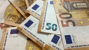 Falling Euro Banknotes 50 euros cash. Investments, family budget and savings concept - Powered by Shutterstock - Get 15% off with code: PIKWIZARD15
