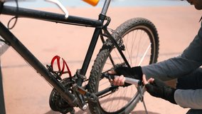 Cyclist Pumping Air Into Tire After Crash. Triathlete Fix His Bicycle After Breakdown. Cyclist Check Gears And Wheels After Cycling Race. Bicyclist Repairing Wheel. Sportsman Repair Bike Flat Tire - Powered by Shutterstock - Get 15% off with code: PIKWIZARD15